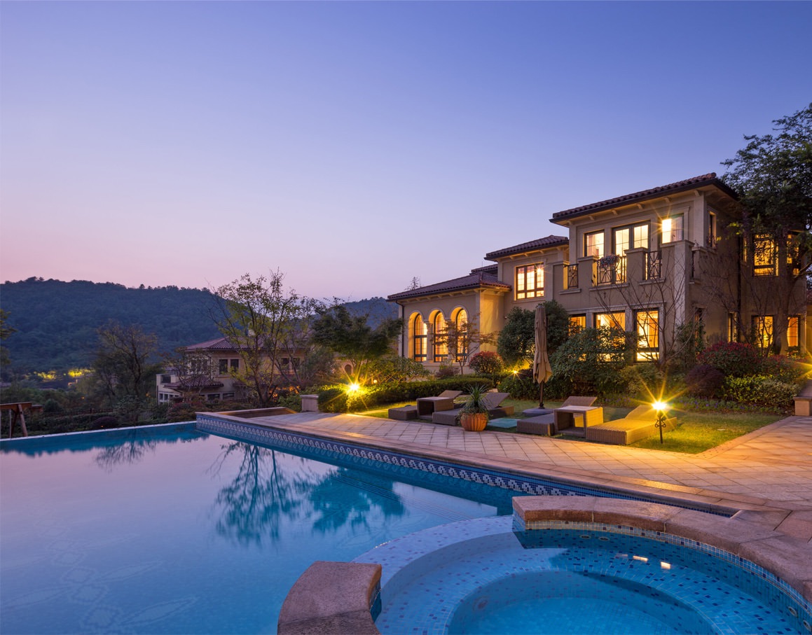 house with the backyard and pool showing
