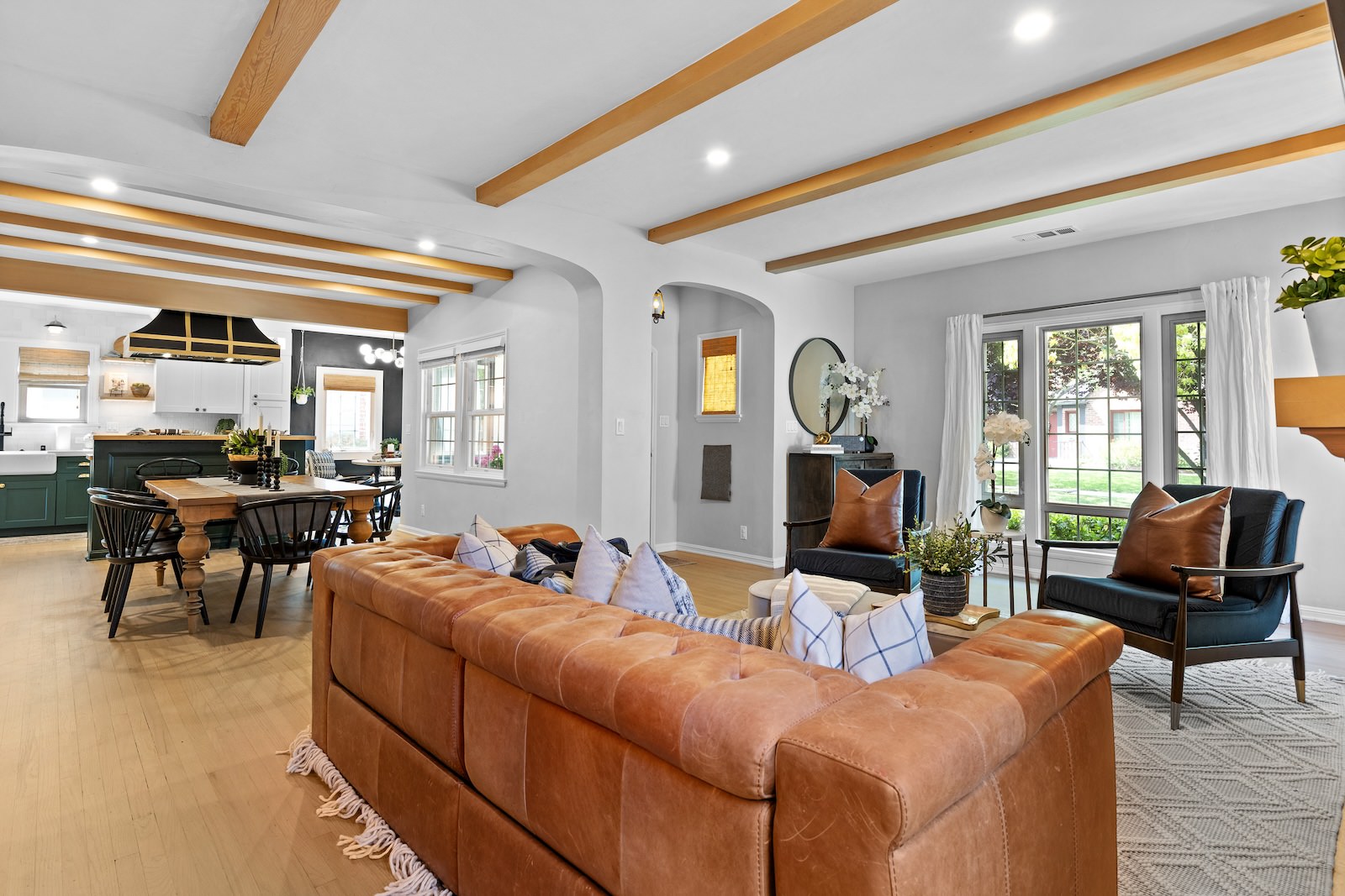 custom living room by creative property renewal - wood ceiling