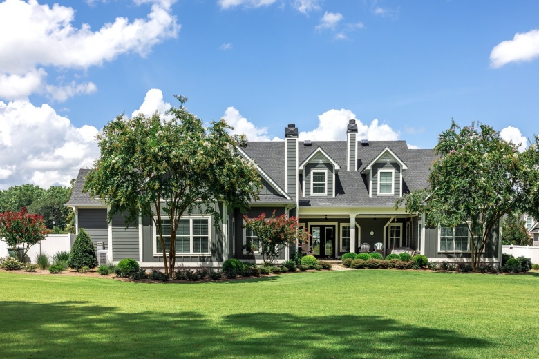 custom home by creative property renewal - outside view - lightbox