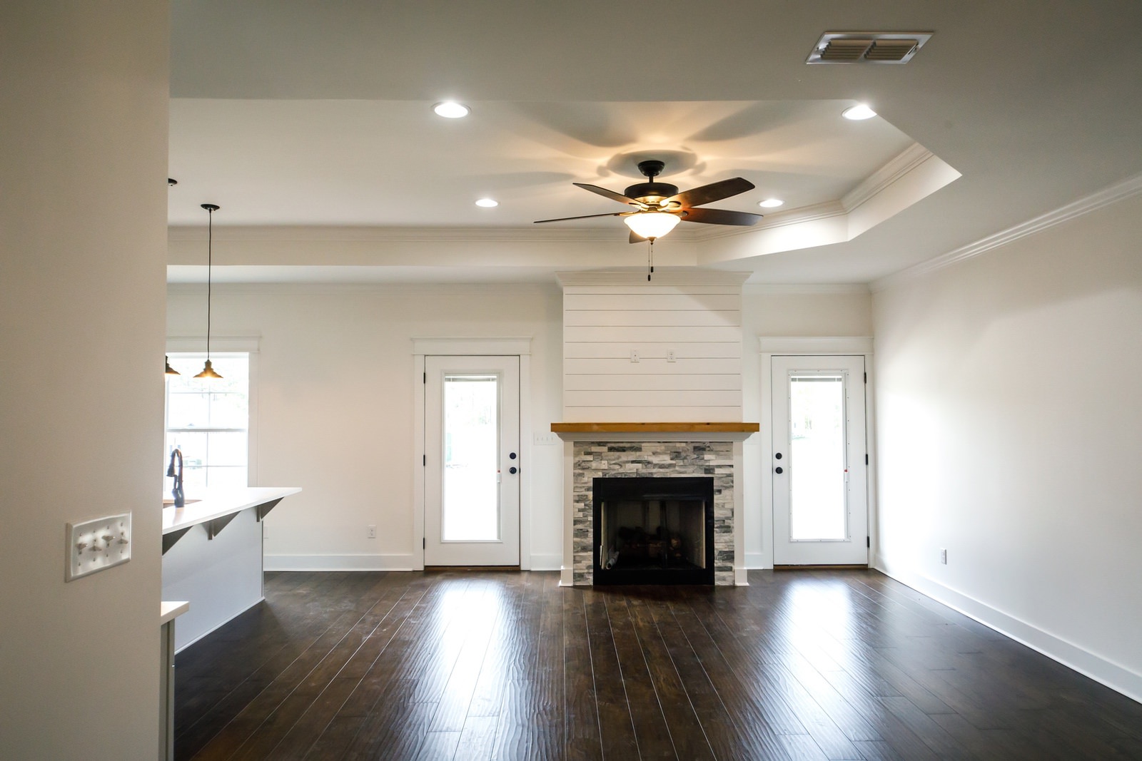 remodeled livingroom by creative property renewal - fireplace - lightbox