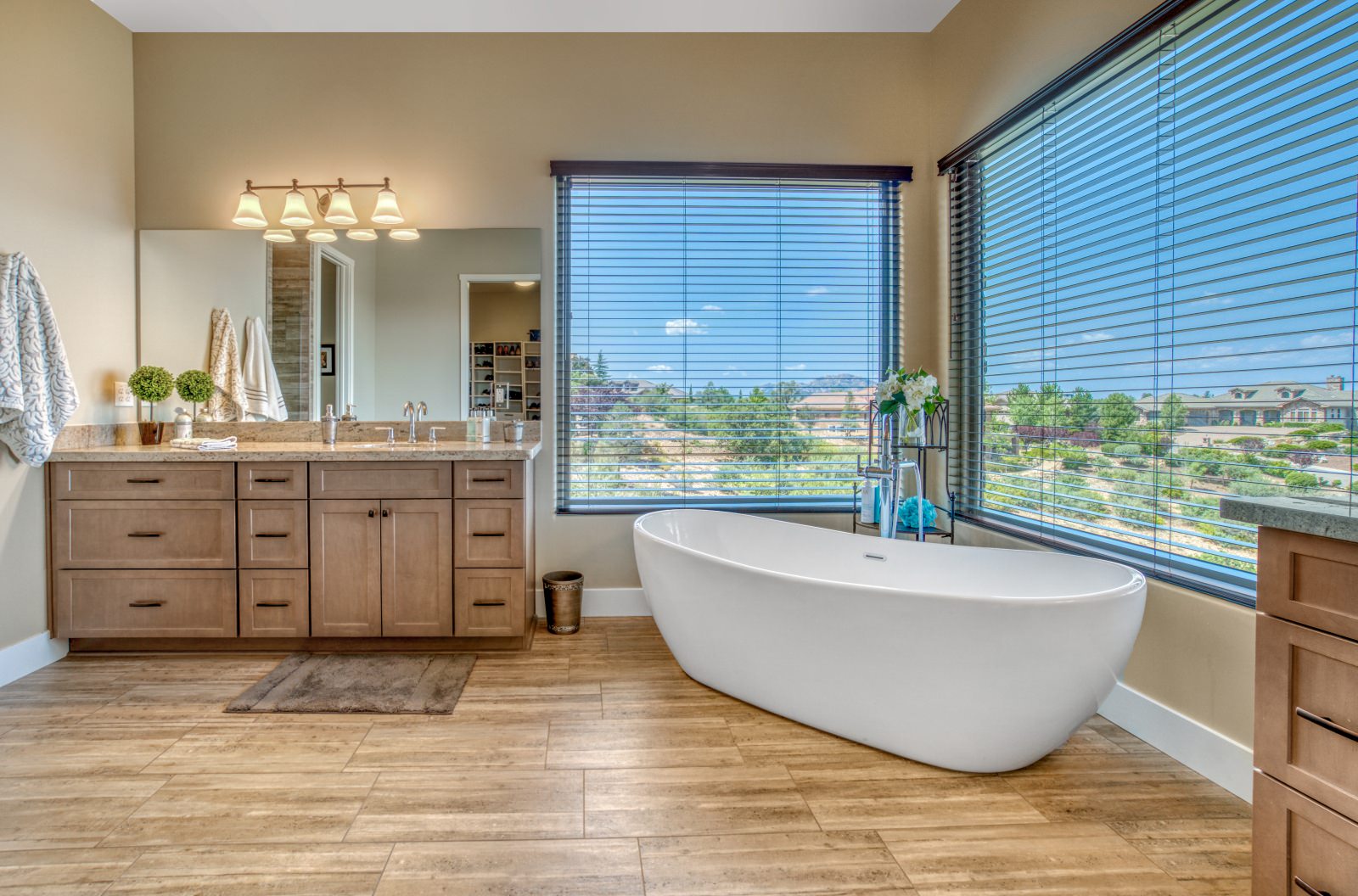picture of a bathroom with a rub in the corner
