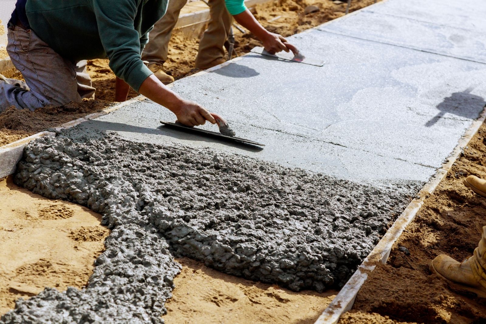 Concrete walkway being troweled in stockto, ca